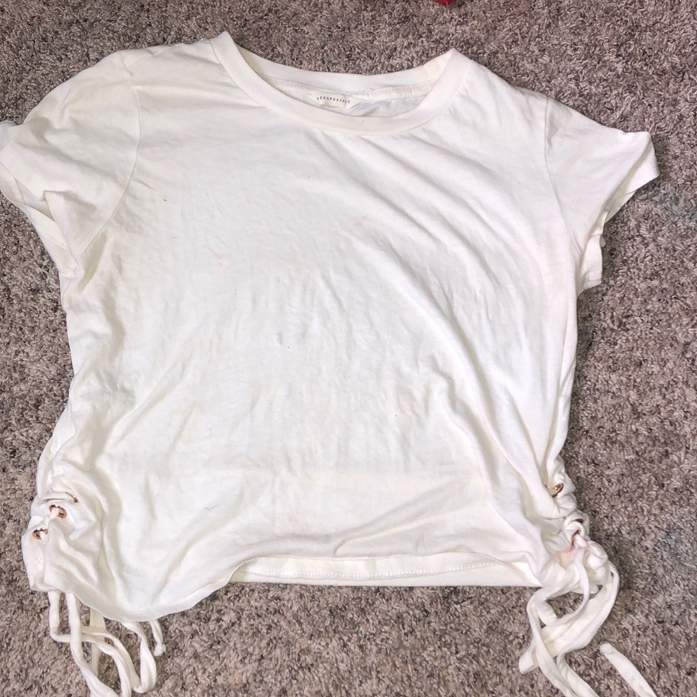 An off white crop top shirt